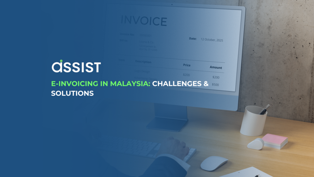 Add a heading (18) Businessman reviewing an e-invoice on a computer screen – E-invoicing in Malaysia for digital tax compliance.